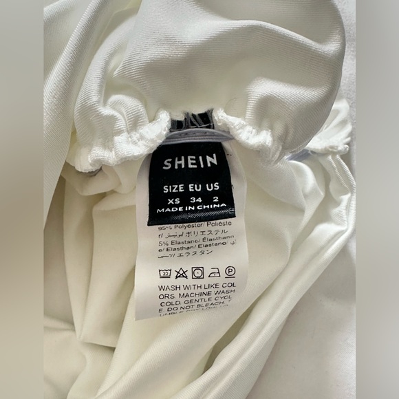 NEW White cut out body con dress. Size XSmall - Picture 7 of 7